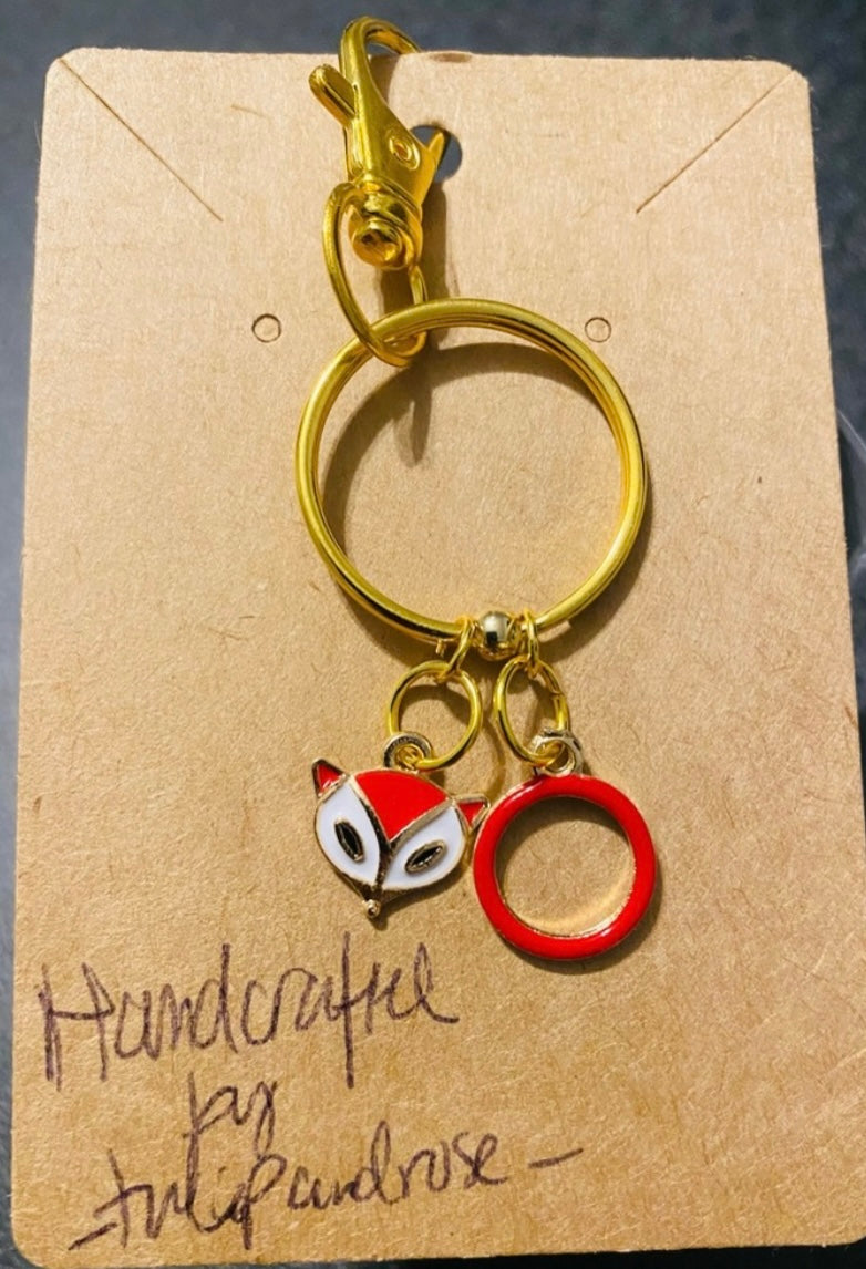 Handmade Cute “Ring Of Fire” Red Fox and Red Circle keychain. Gold-tone.