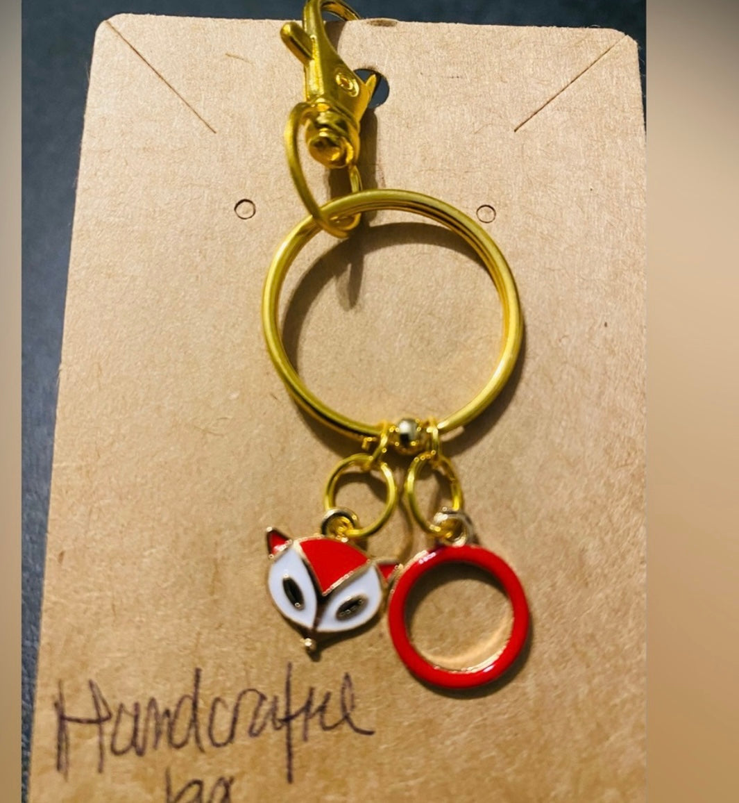 Handmade Cute “Ring Of Fire” Red Fox and Red Circle keychain. Gold-tone.