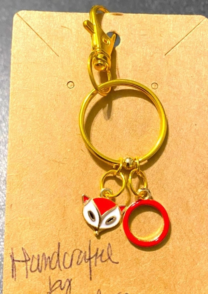 Handmade Cute “Ring Of Fire” Red Fox and Red Circle keychain. Gold-tone.