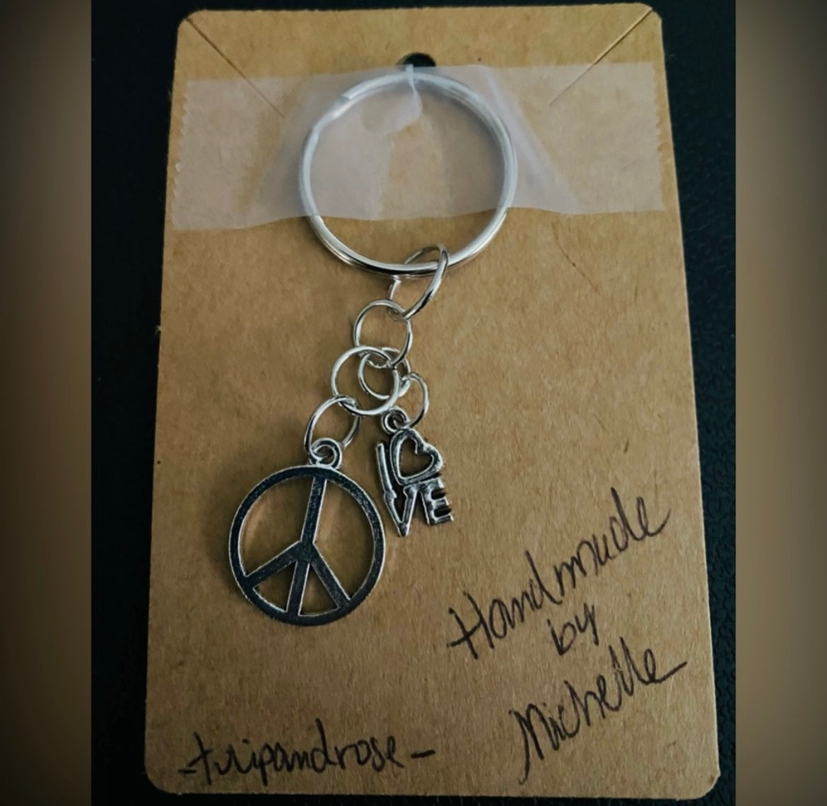 Handmade Love & Peace keychain. Silver-tone.