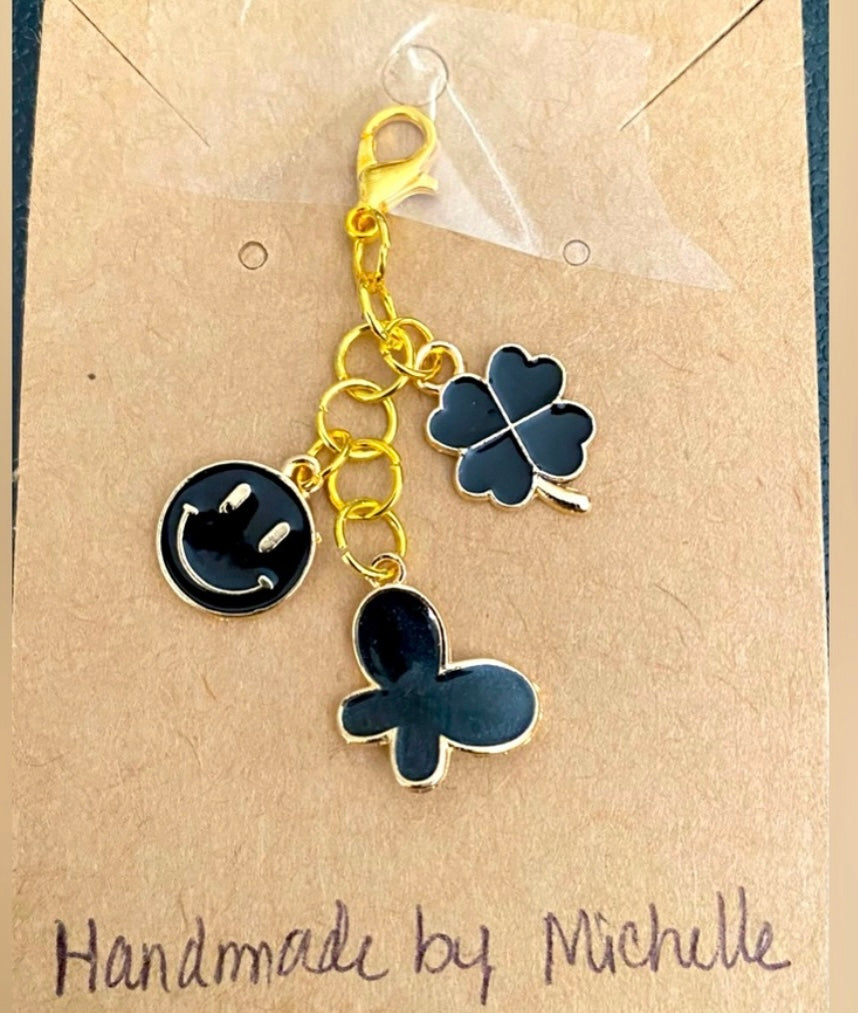 Handcrafted Bag/Zipper Charms Black Butterfly, Smiley Face, Clover gold tone