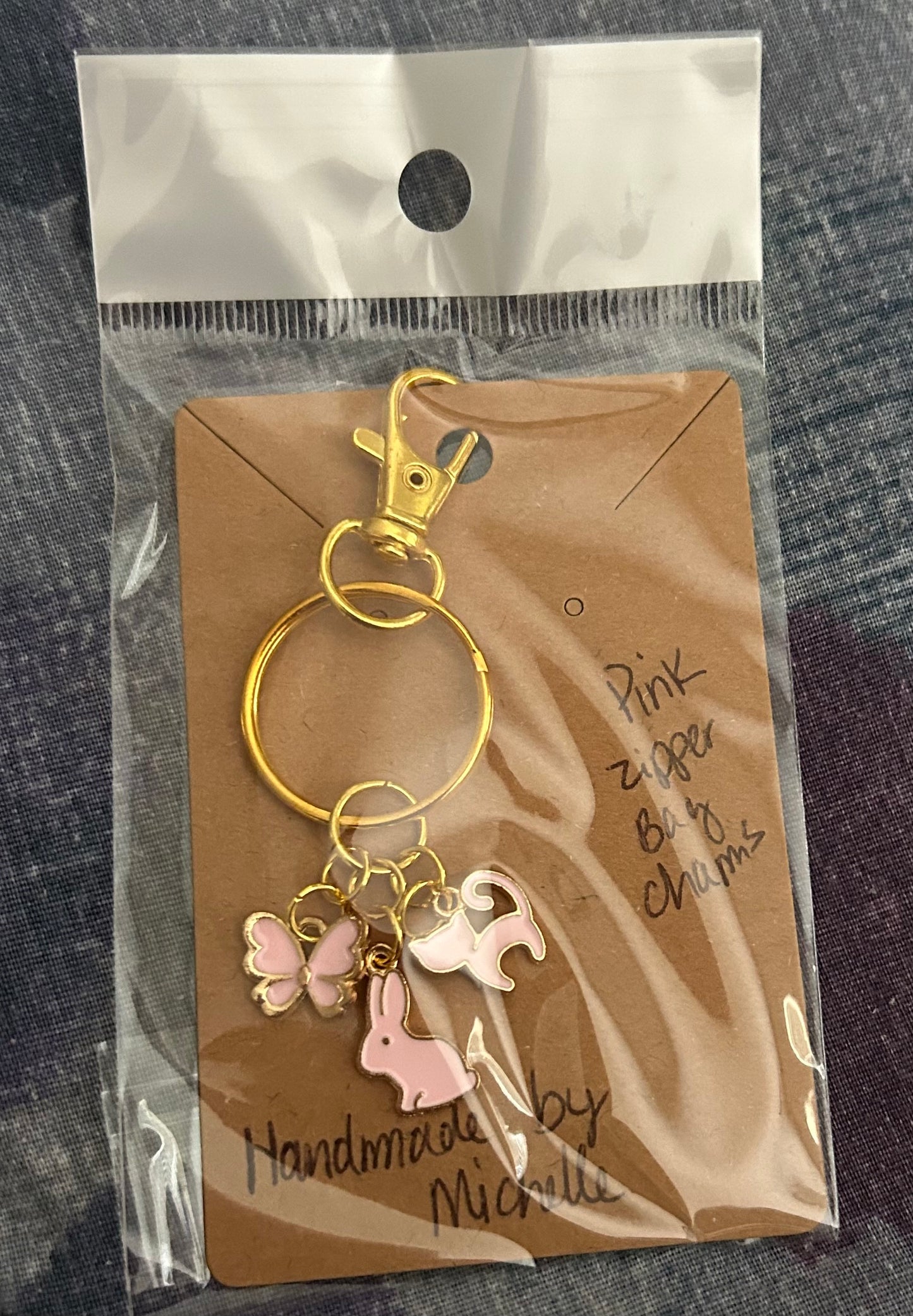 Handcrafted Collection of Charms keychain. Pink and Gold tone.