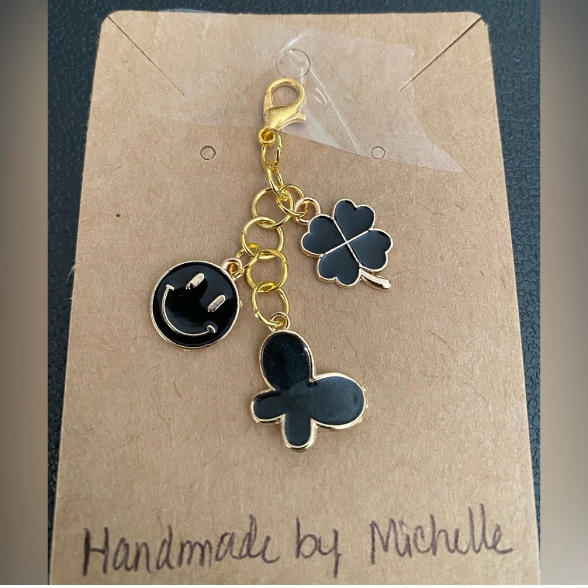 Handcrafted Bag/Zipper Charms Black Butterfly, Smiley Face, Clover gold tone